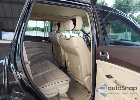 2014 Jeep Grand Cherokee Overland z USA, uszkodzony, nr VIN 1C4RJFCG4EC355890